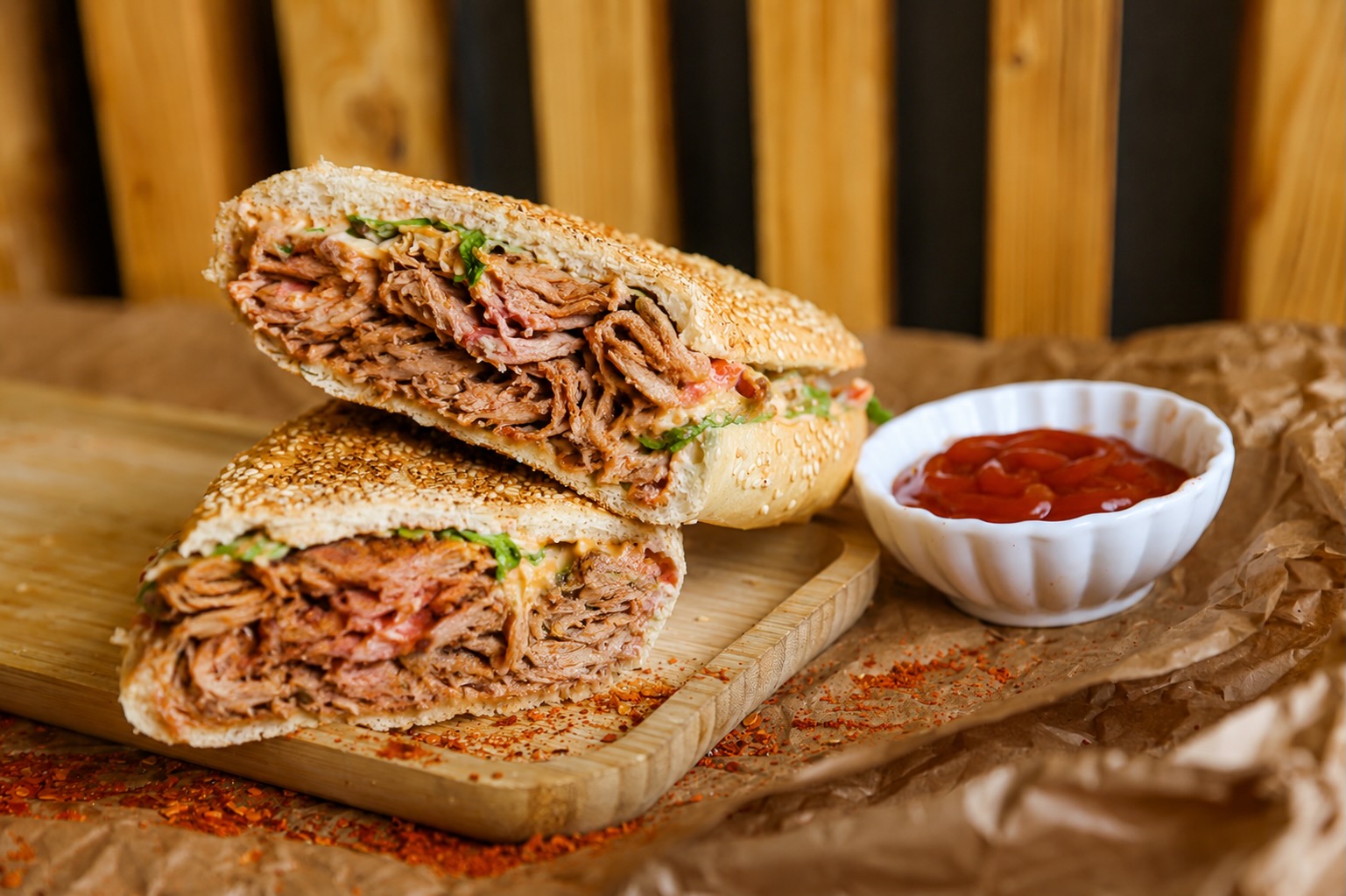 SHAUROOM shawarma in sesame bread, sliced and served with ketchup